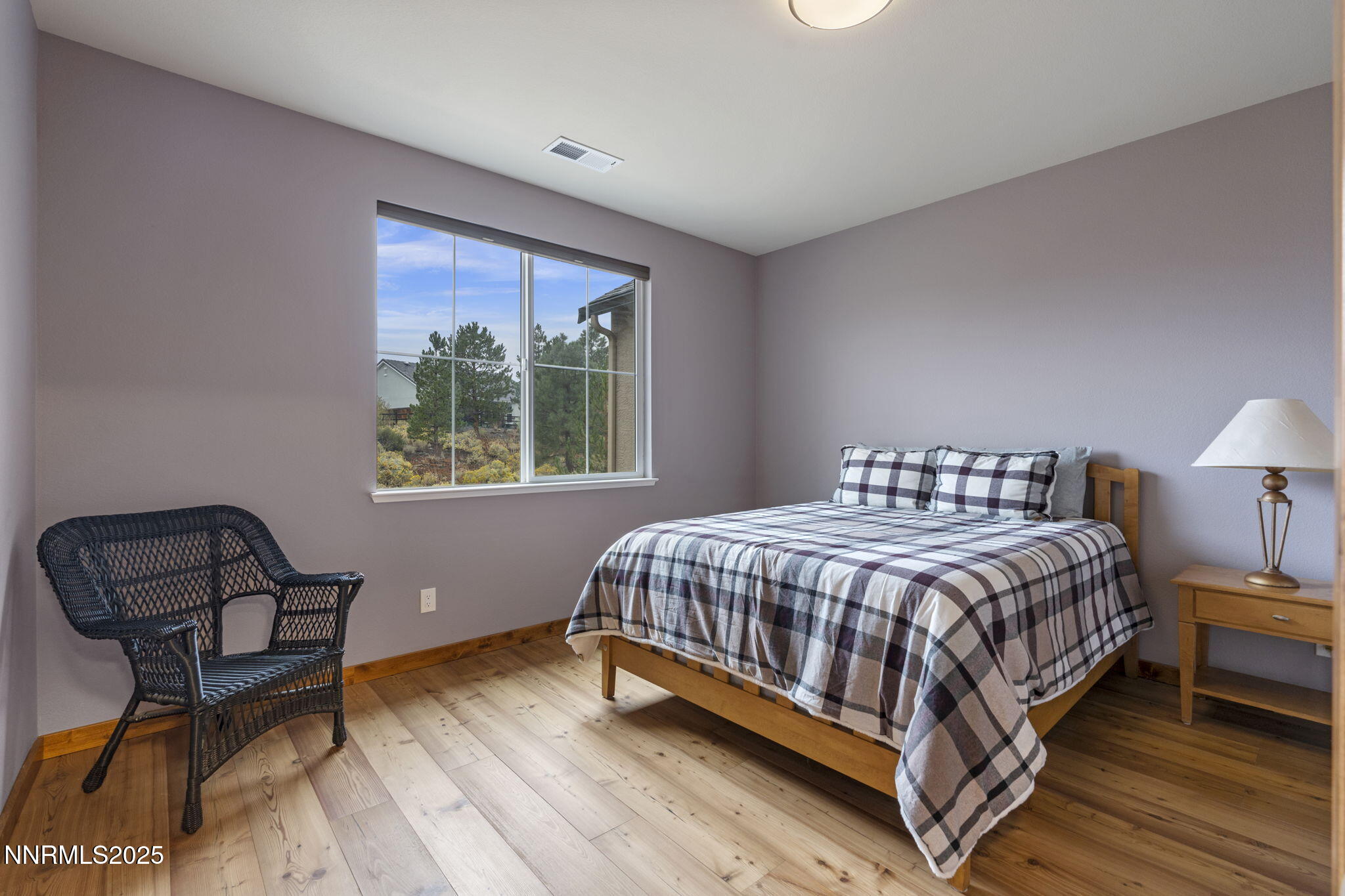 2117 Tara Ridge Trail Reno, NV 89523 - Photo 20 of 25 a bedroom with a bed chair and window