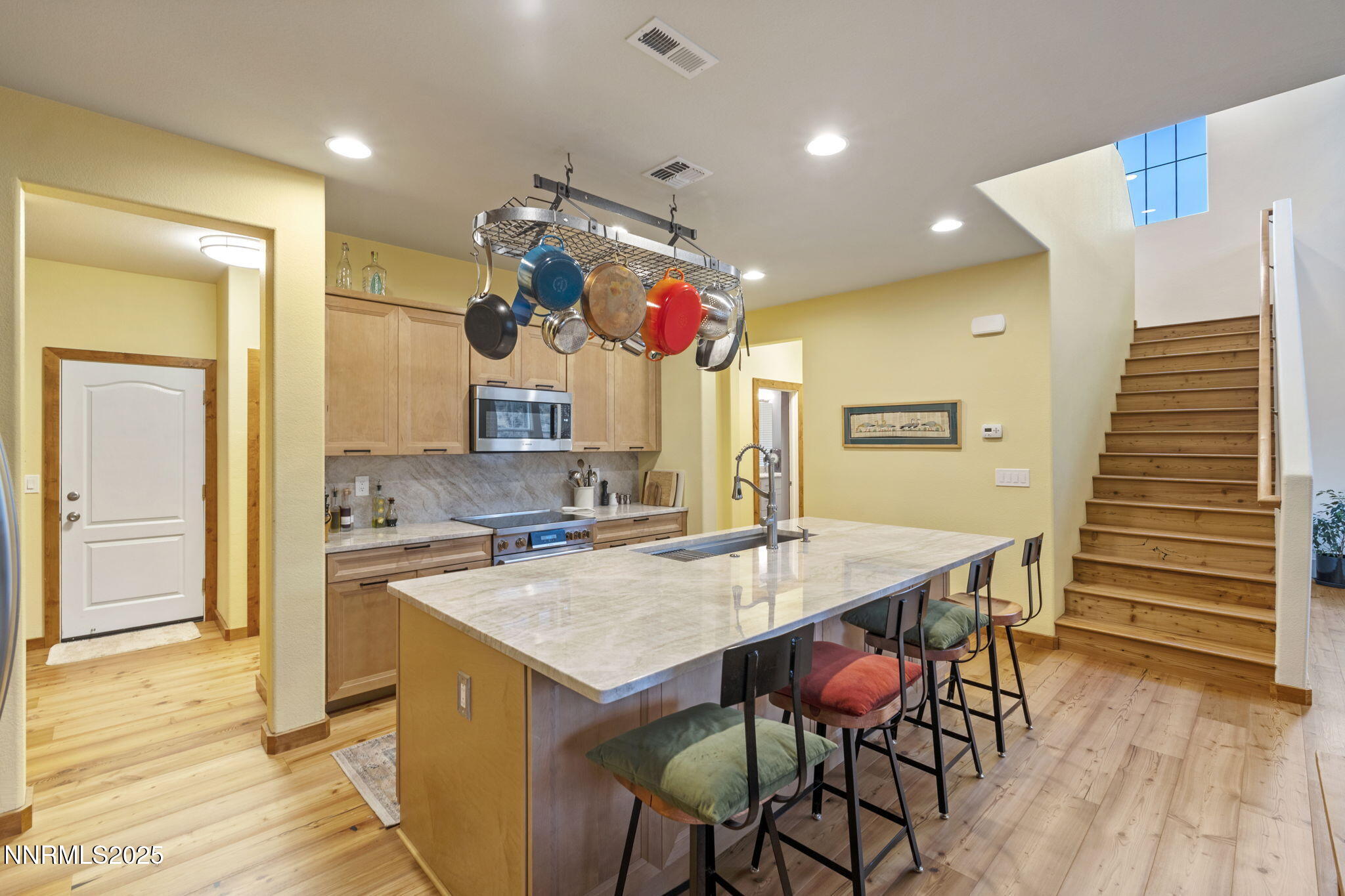 2117 Tara Ridge Trail Reno, NV 89523 - Photo 10 of 25 a kitchen with a table and chairs in it