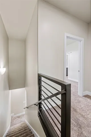 a bedroom with a bed and a television