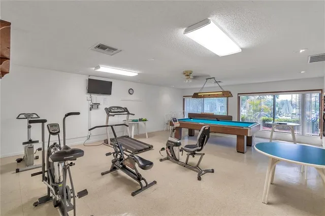 a view of a room with gym equipment