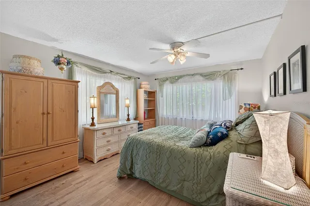 a bed room with a bed and furniture