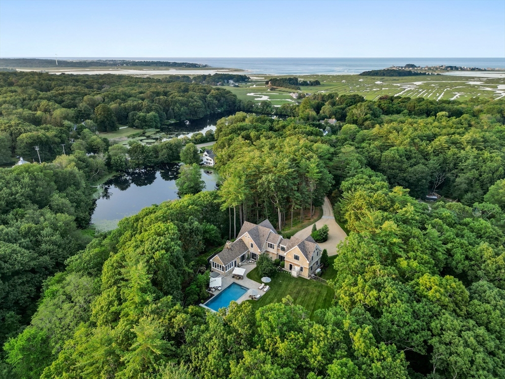 an aerial view of residential house with outdoor space