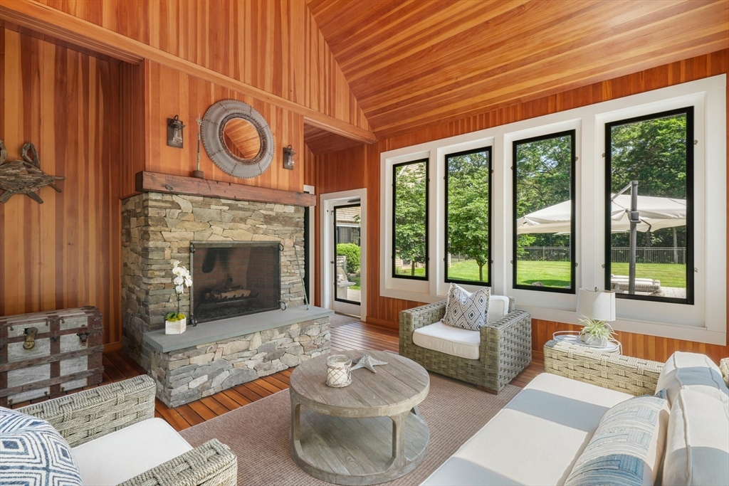 695 Summer Street Marshfield, MA 02050 - Photo 13 of 35 a living room with furniture and a fireplace