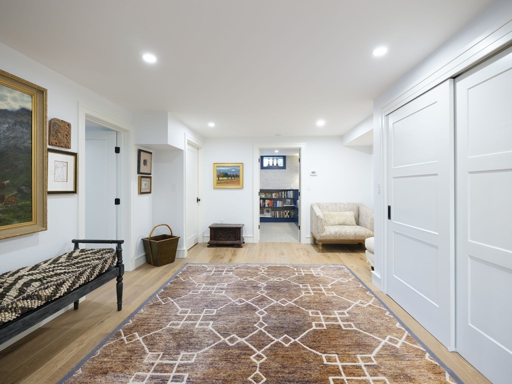 695 Summer Street Marshfield, MA 02050 - Photo 21 of 35 a living room with furniture and a rug