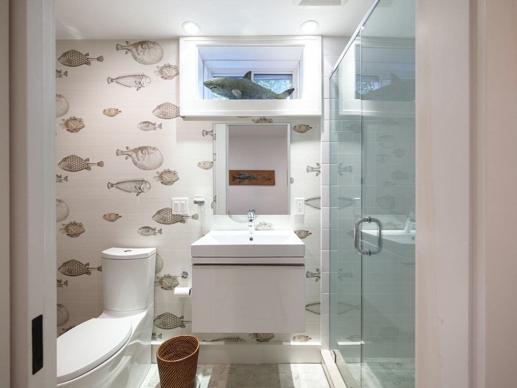695 Summer Street Marshfield, MA 02050 - Photo 25 of 35 a bathroom with a sink toilet and shower