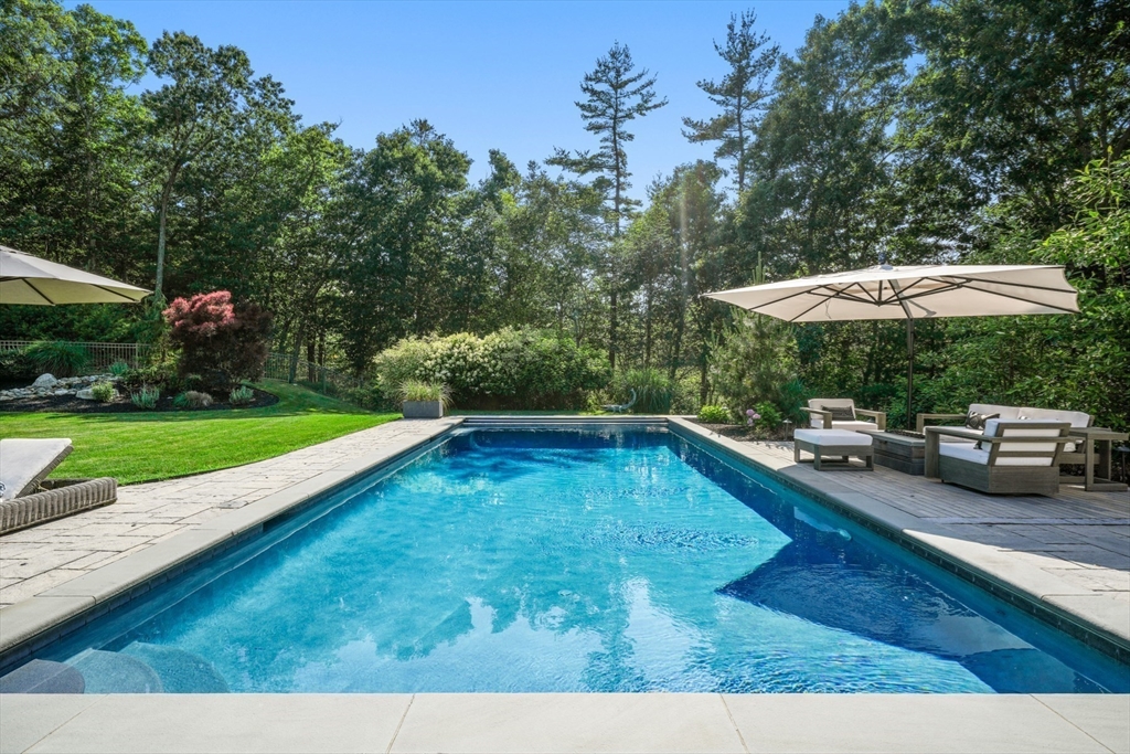 695 Summer Street Marshfield, MA 02050 - Photo 28 of 35 a swimming pool view with a couple of chairs