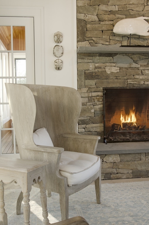 695 Summer Street Marshfield, MA 02050 - Photo 10 of 35 a living room with furniture and a fireplace