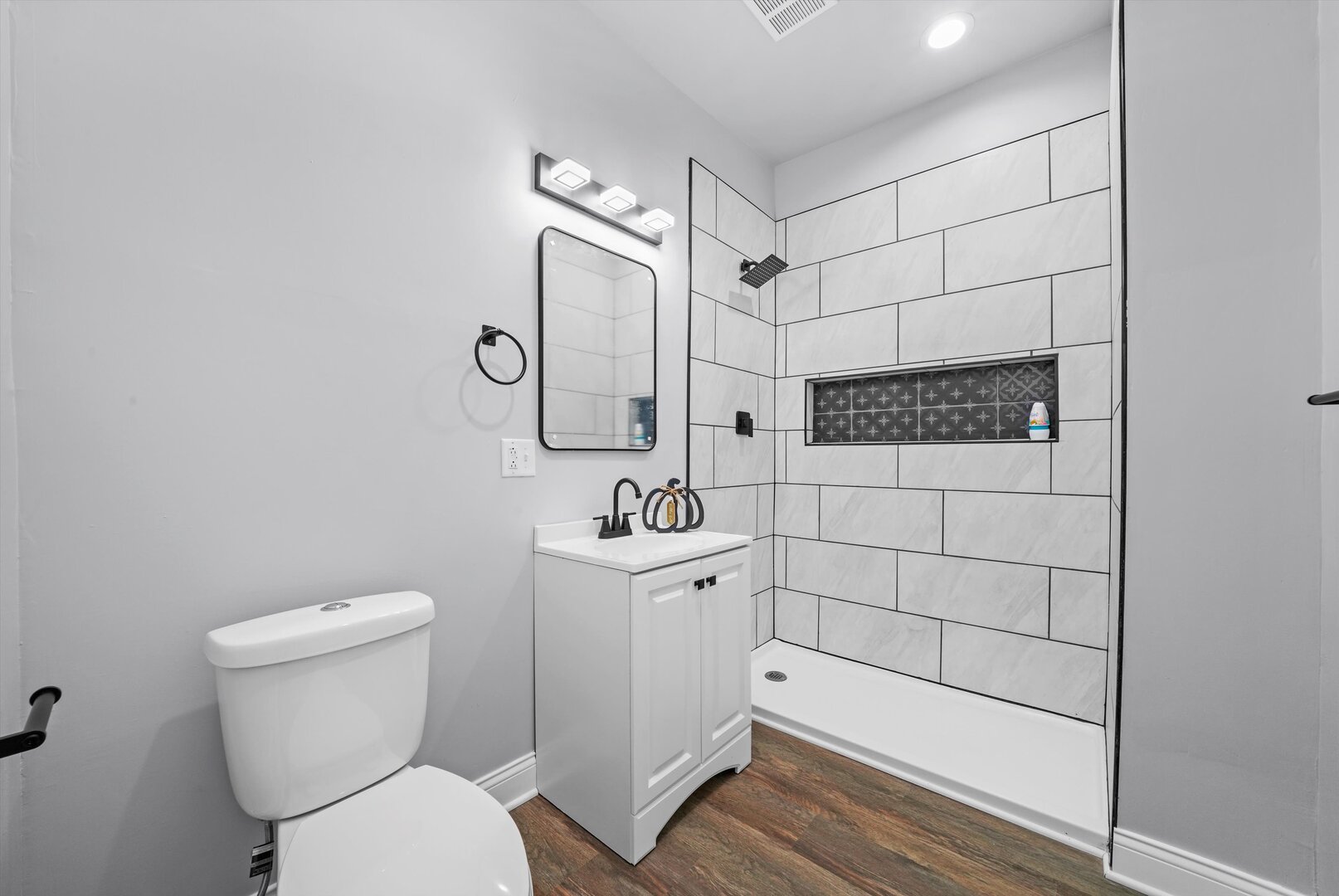 7917 South Ellis Avenue Chicago, IL 60619 - Photo 11 of 33 a bathroom with a toilet sink and shower