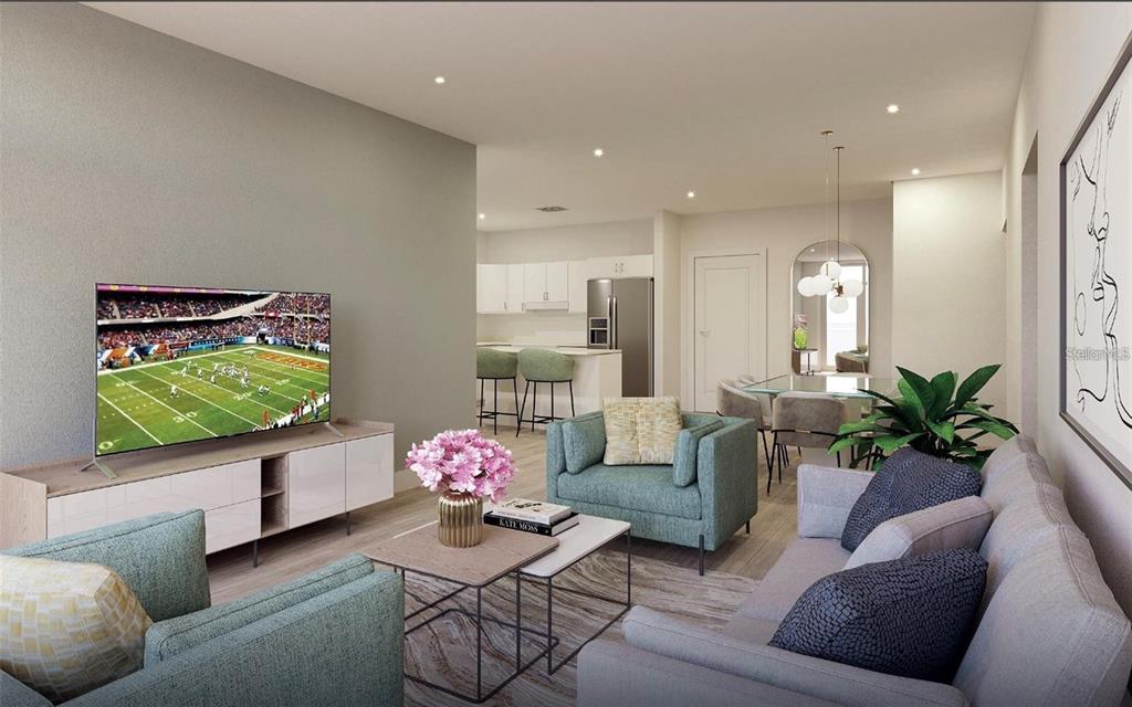 3101 Old Archer Road, Unit 406 Gainesville, FL 32608 - Photo 2 of 8 a living room with furniture and a potted plant