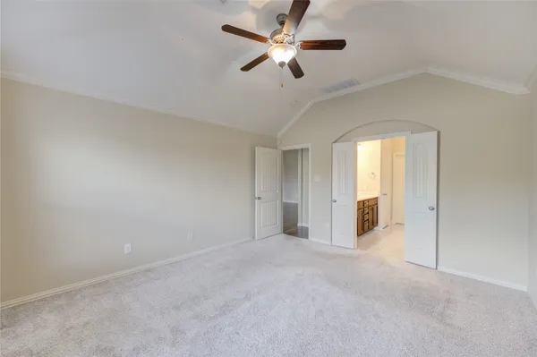 a bathroom with a granite countertop sink a large mirror and a shower