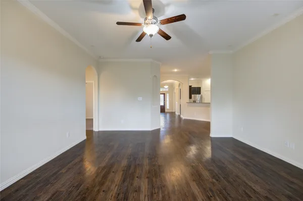 a view of a livingroom with wooden floor