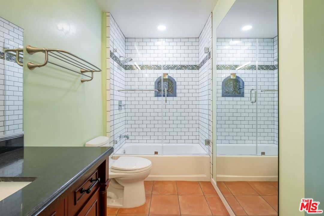 6820 Parsons Trail Tujunga, CA 91042 - Photo 21 of 36 a bathroom with a bathtub a toilet and a shower