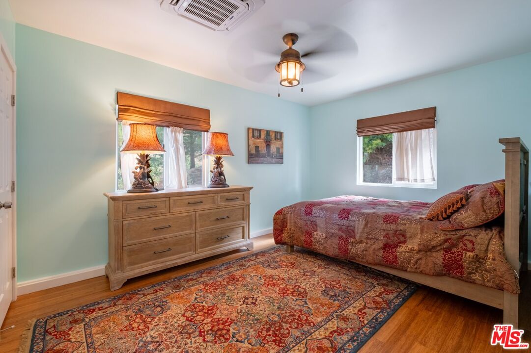 6820 Parsons Trail Tujunga, CA 91042 - Photo 22 of 36 a bed room with a bed and a dresser