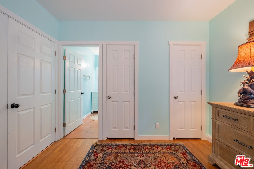 6820 Parsons Trail Tujunga, CA 91042 - Photo 24 of 36 a bedroom with a bed and a dresser