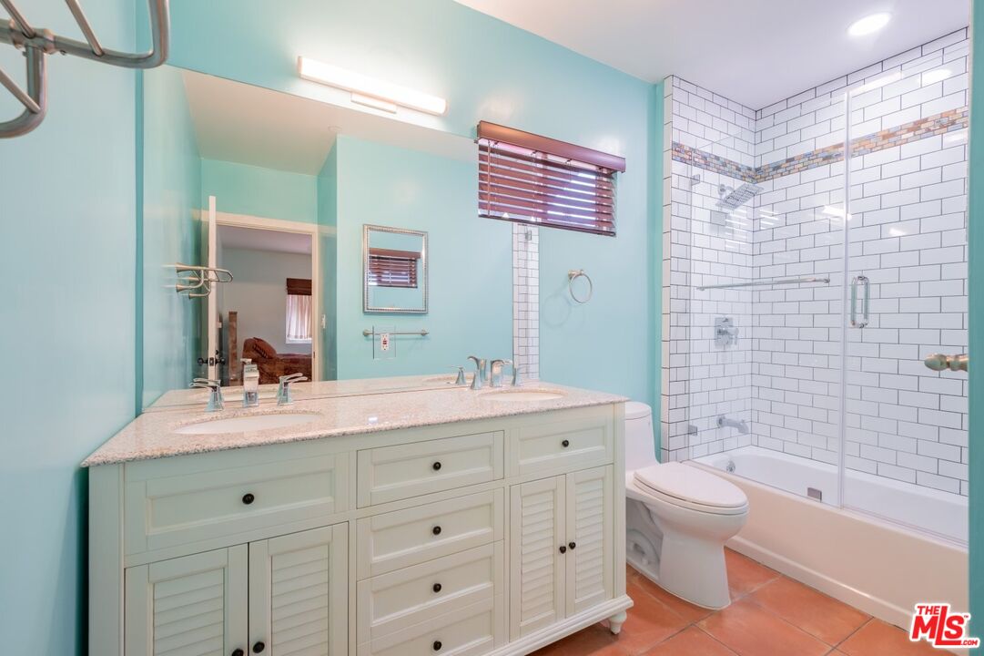 6820 Parsons Trail Tujunga, CA 91042 - Photo 25 of 36 a bathroom with a sink a toilet tub and shower