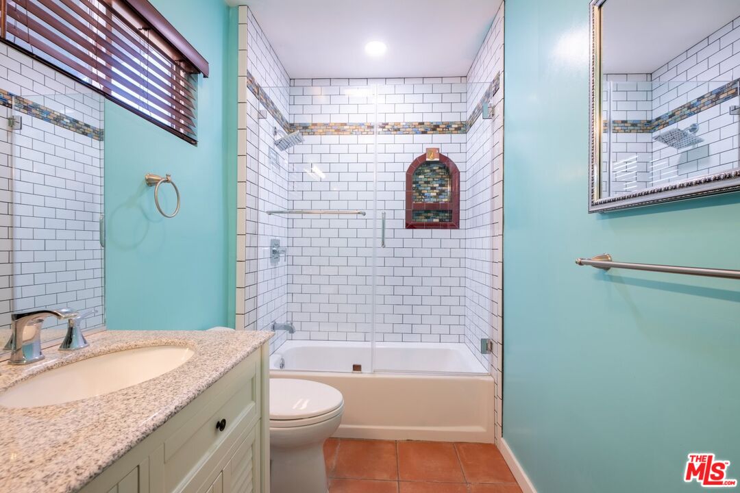 6820 Parsons Trail Tujunga, CA 91042 - Photo 26 of 36 a bathroom with a granite countertop sink toilet and shower