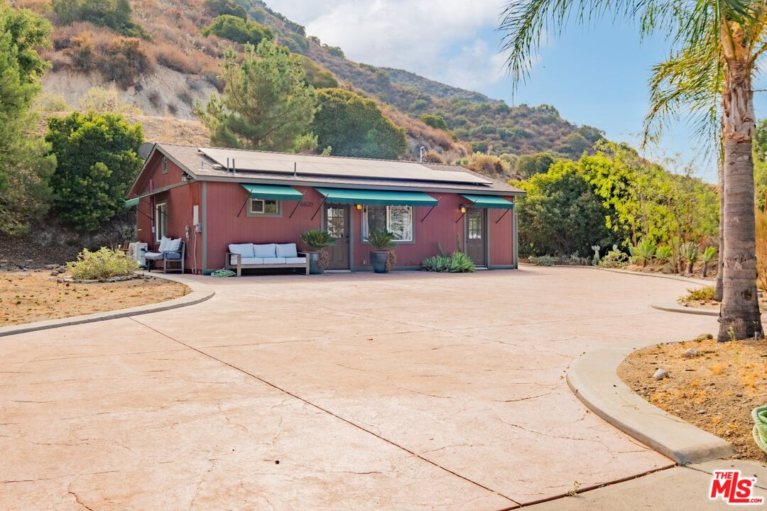 6820 Parsons Trail Tujunga, CA 91042 - Photo 28 of 36 a view of a house with a snow in the yard