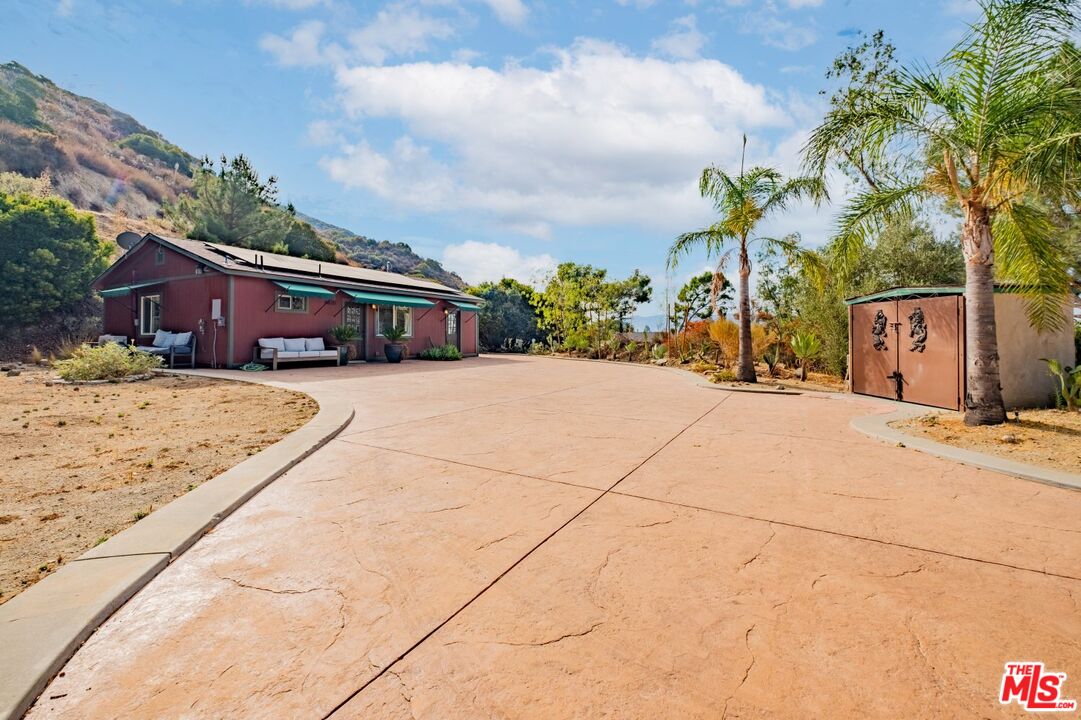 6820 Parsons Trail Tujunga, CA 91042 - Photo 7 of 36 a view of a house with a snow on the road