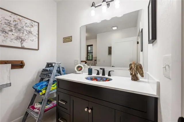 a view of a balcony with lake view and a large window