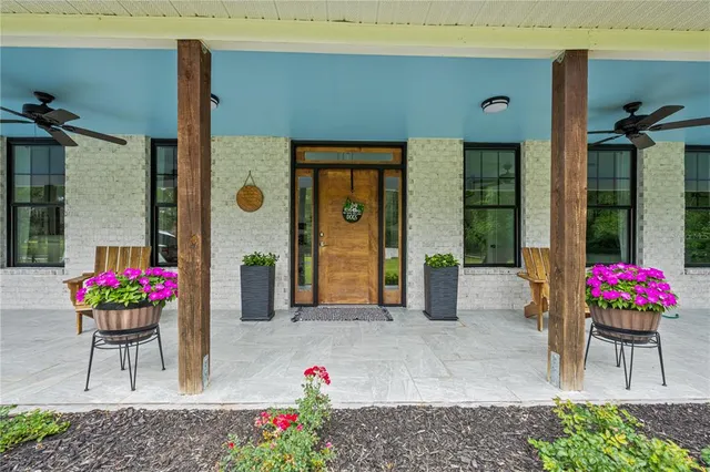 a kitchen with stainless steel appliances a refrigerator and cabinets