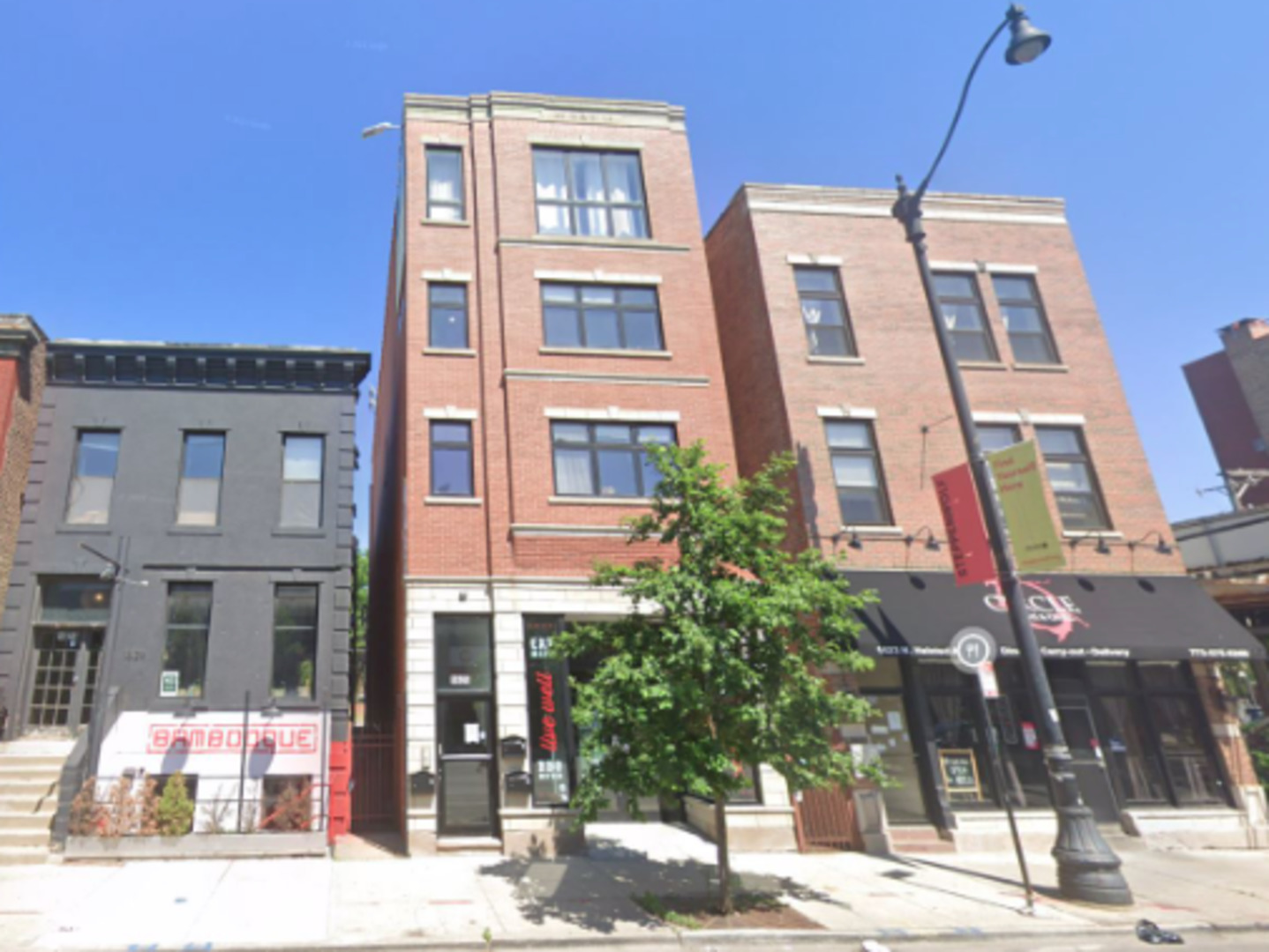 1623 North Halsted Street Chicago, IL 60614 - Photo 3 of 9 a front view of a multi story building