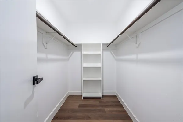a view of an empty walk in closet
