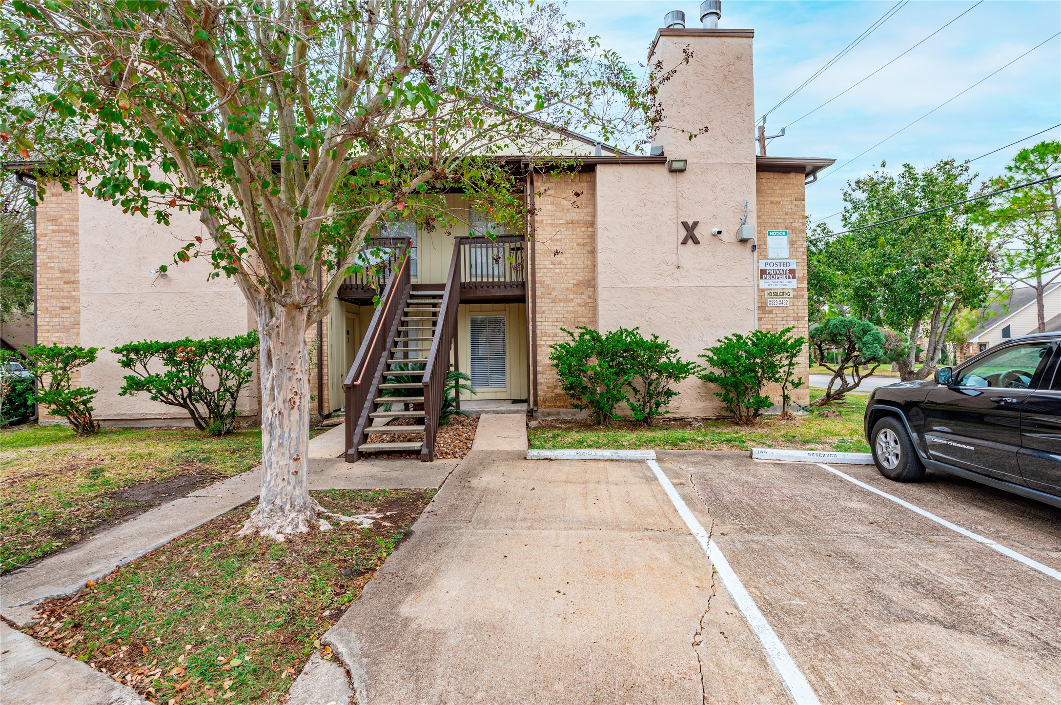 1500 Bay Area Boulevard, Unit 331 Houston, TX 77058 - Photo 2 of 27 front view of a house with a yard