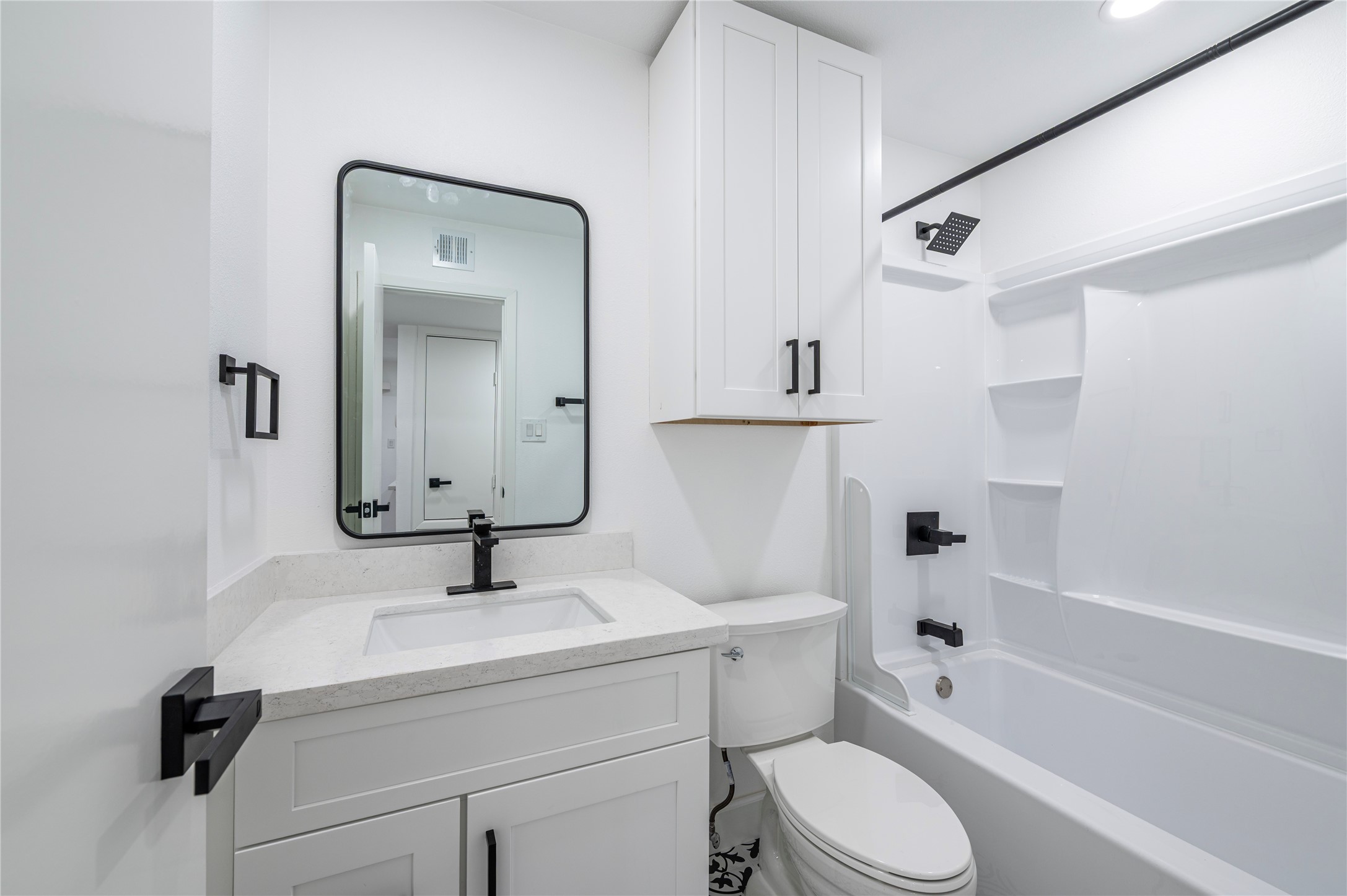 1500 Bay Area Boulevard, Unit 331 Houston, TX 77058 - Photo 21 of 27 a bathroom with a sink toilet and shower