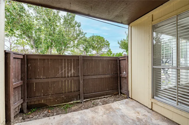 a view of backyard with green space