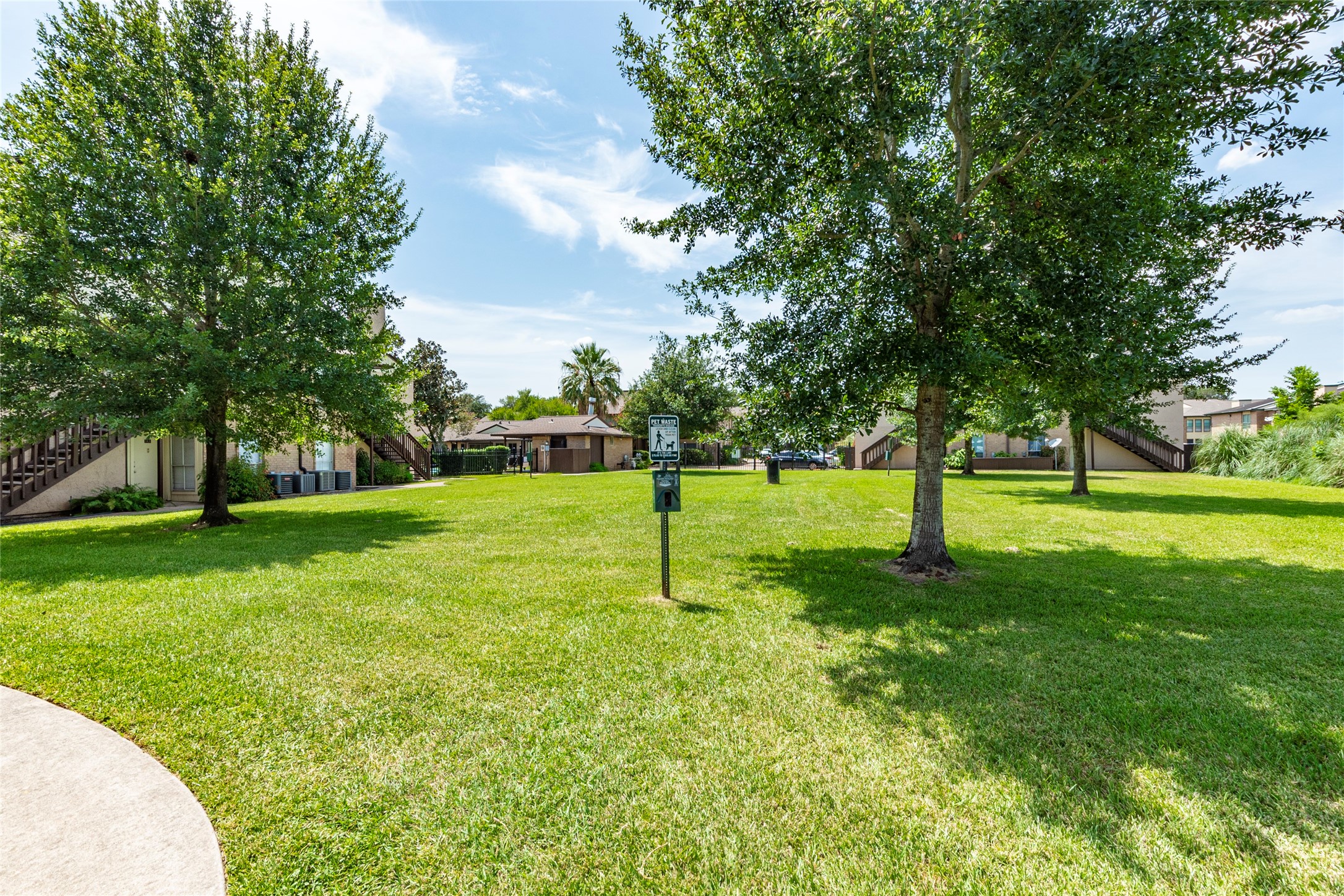 1500 Bay Area Boulevard, Unit 331 Houston, TX 77058 - Photo 27 of 27 a house with trees in the background
