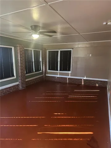 a bathroom with a sink toilet and a mirror