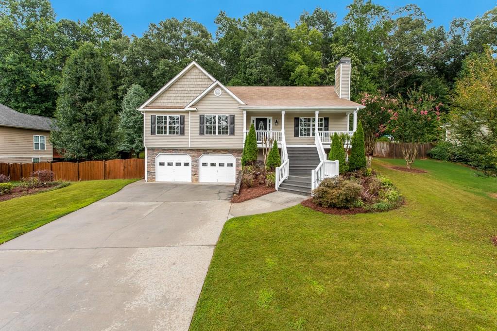 Lovely raised Ranch on a full finished basement! Relax on the generous front porch and enjoy the peace & quiet of this cul-de-sac lot!