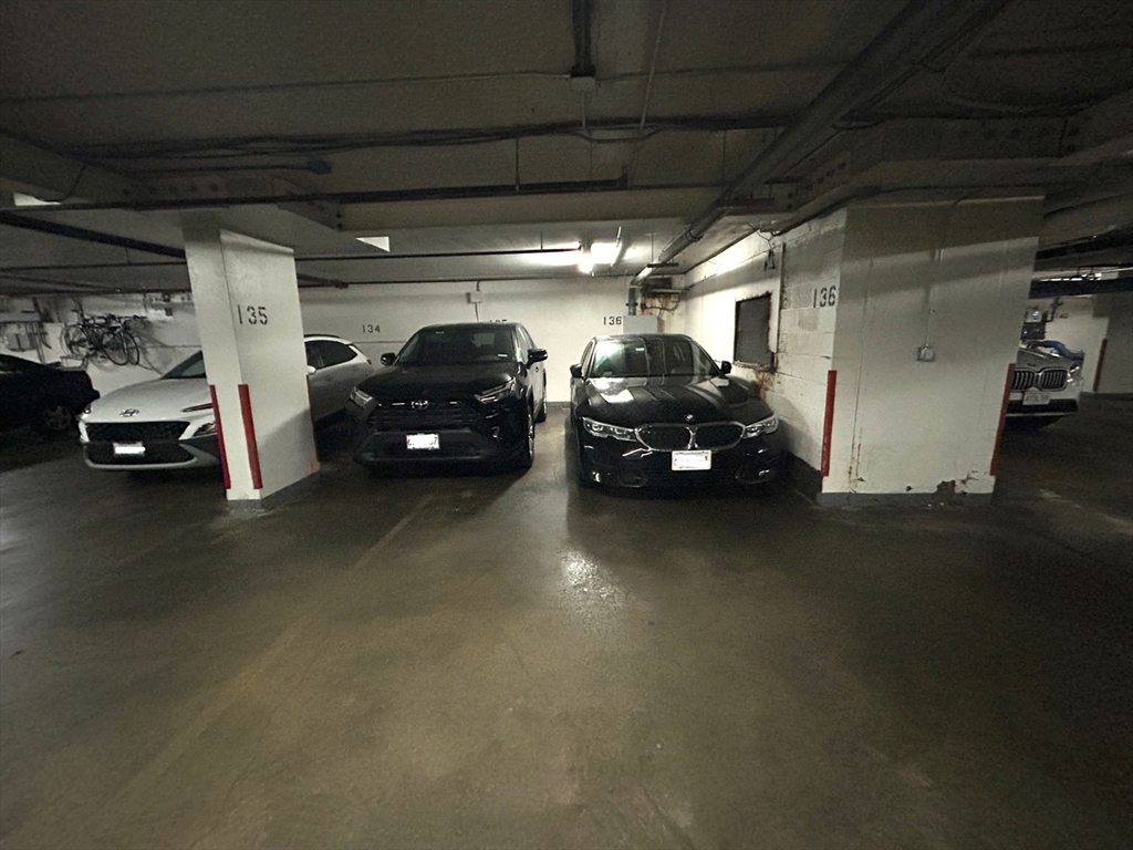 33 Pond Avenue, Unit 401 Brookline, MA 02445 - Photo 7 of 16 a car parked in parking area