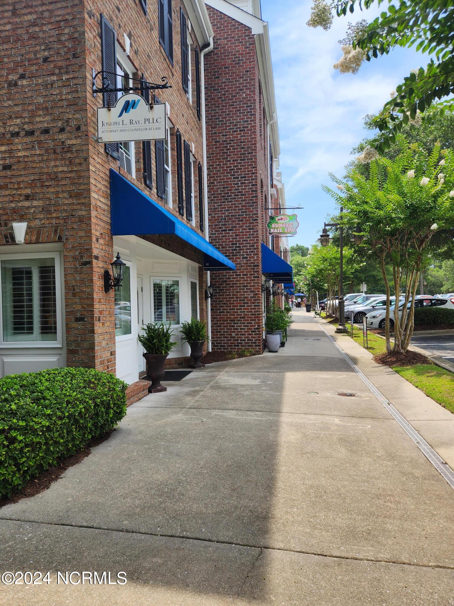 7645 High Market Street, Unit 4 Sunset Beach, NC 28468 - Photo 24 of 33 View of shops on queen Anne Street