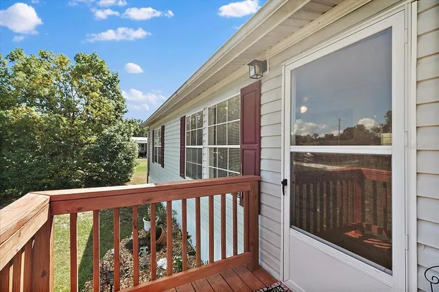 a view of a balcony with a small cabin