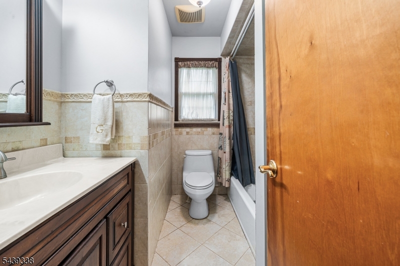 1 Oak Grove Road Flemington, NJ 08822 - Photo 19 of 29 a bathroom with a sink a toilet and shower