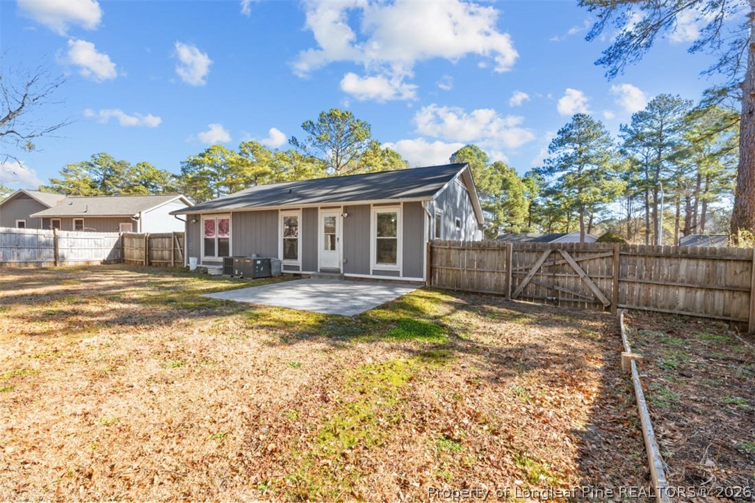 3305 Hunting Bay Drive Spring Lake, NC 28390 - Photo 22 of 27 a view of a house with a swimming pool