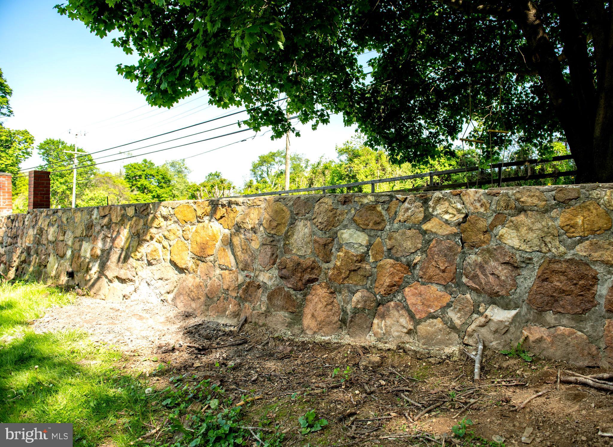 1800 White Hall Road White Hall, MD 21161 - Photo 38 of 52 Salvaged old stone wall offers historic charm