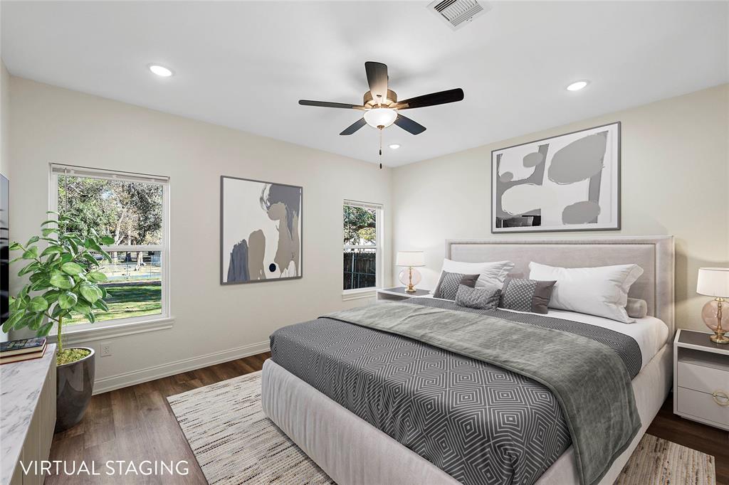 603 South Harrison Street West, TX 76691 - Photo 13 of 30 a bedroom with a large bed and a window