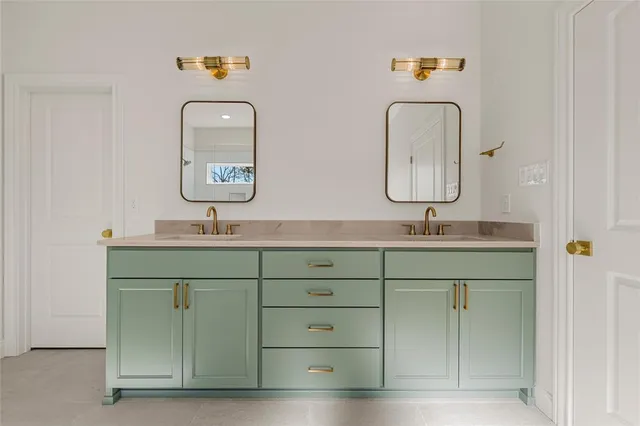 a white bath tub sitting next to a white sink