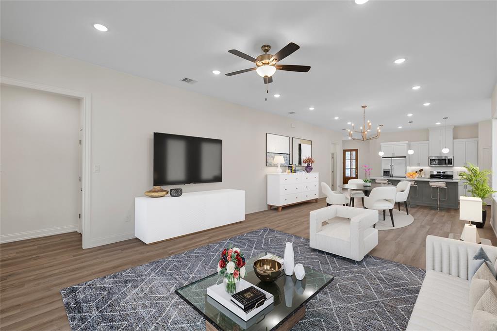 603 South Harrison Street West, TX 76691 - Photo 3 of 30 a living room with furniture and a flat screen tv