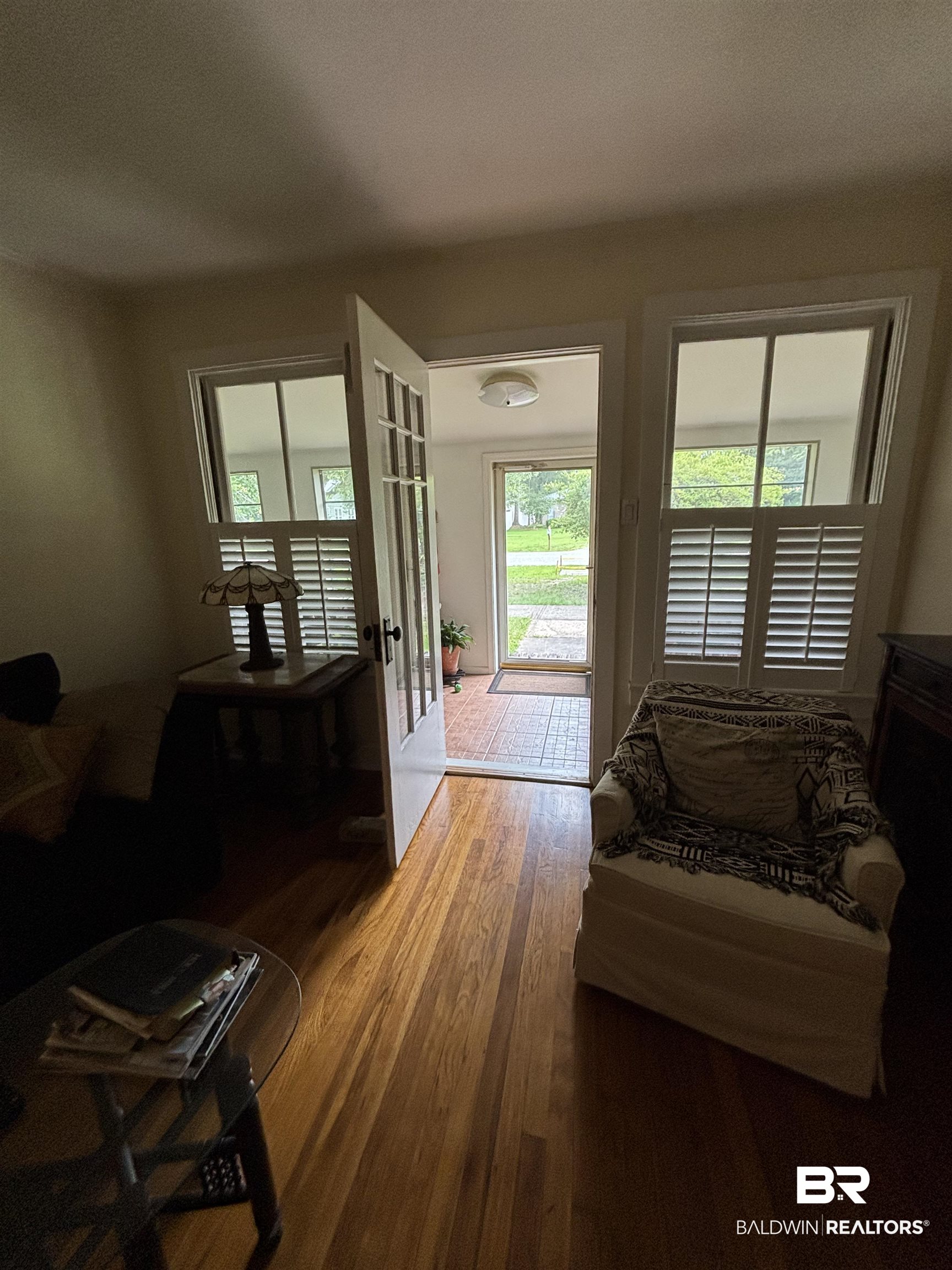 216 West Orange Avenue Foley, AL 36535 - Photo 25 of 37 Living room with wood finished floors and plenty of natural light