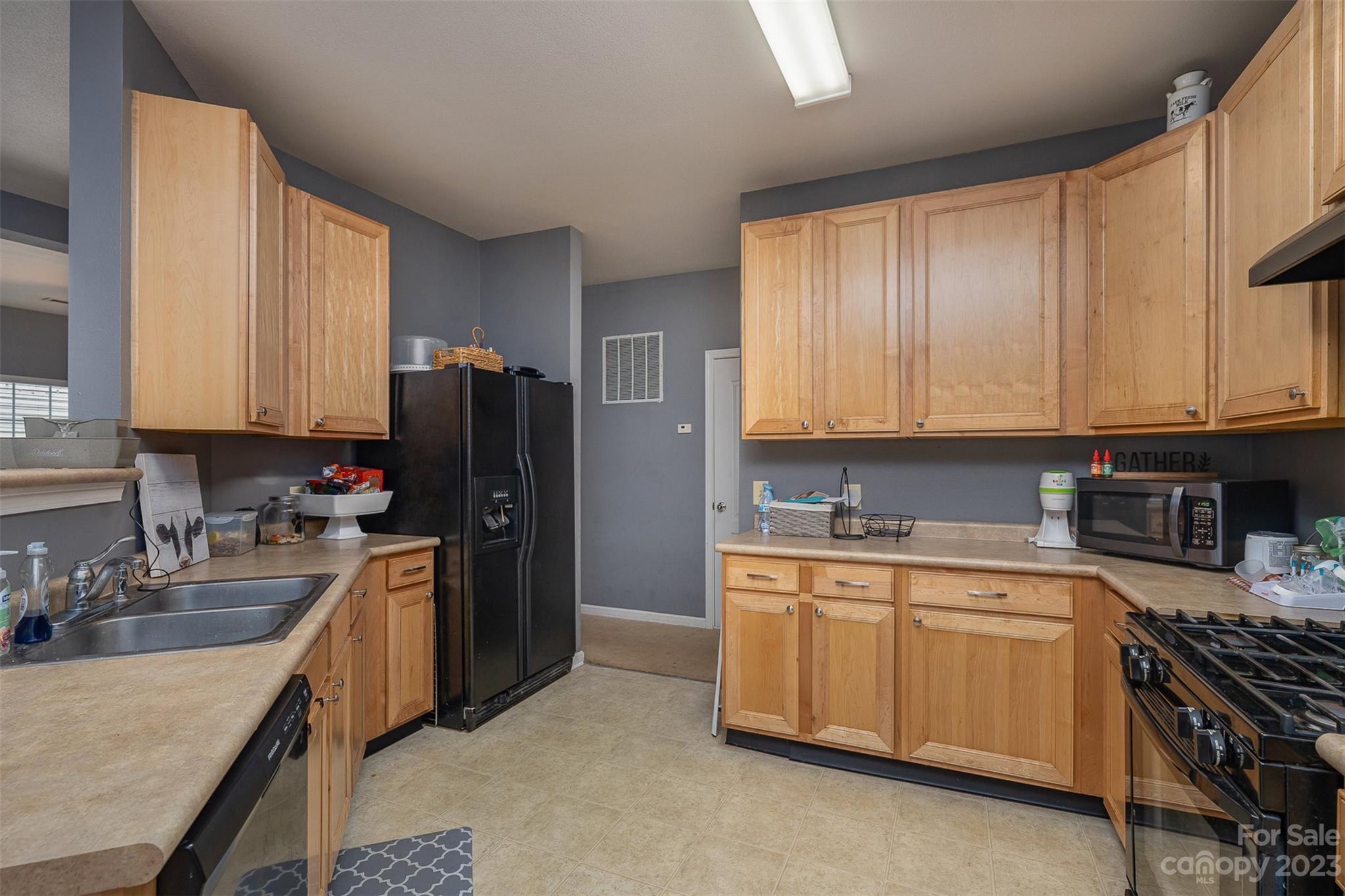 2070 Durand Road Fort Mill, SC 29715 - Photo 12 of 28 a kitchen with a sink stove and refrigerator