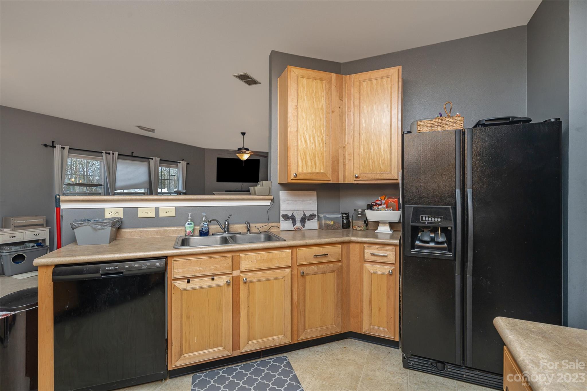 2070 Durand Road Fort Mill, SC 29715 - Photo 13 of 28 a kitchen with a sink a refrigerator and cabinets