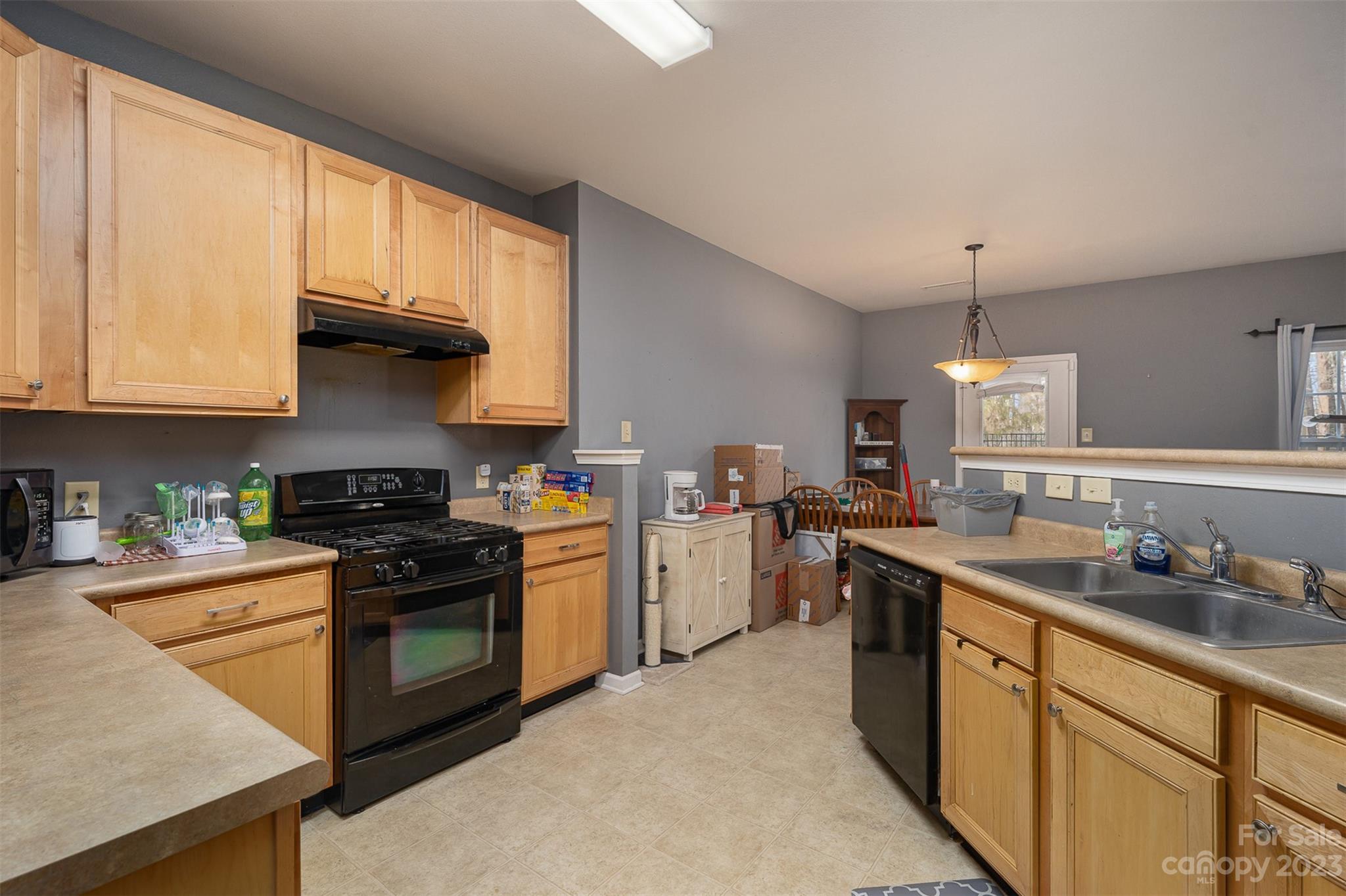 2070 Durand Road Fort Mill, SC 29715 - Photo 14 of 28 a kitchen with stainless steel appliances granite countertop a sink stove and refrigerator