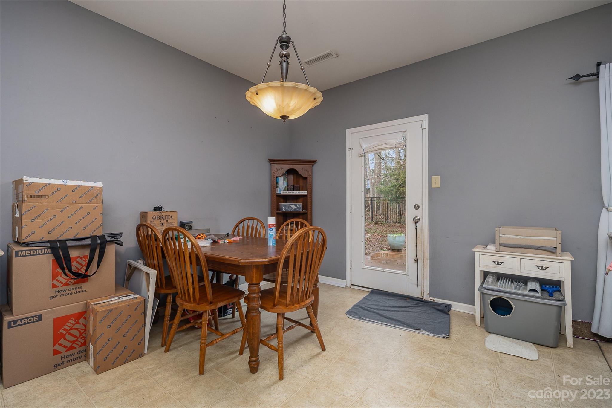 2070 Durand Road Fort Mill, SC 29715 - Photo 16 of 28 a view of a dining room with furniture and a window