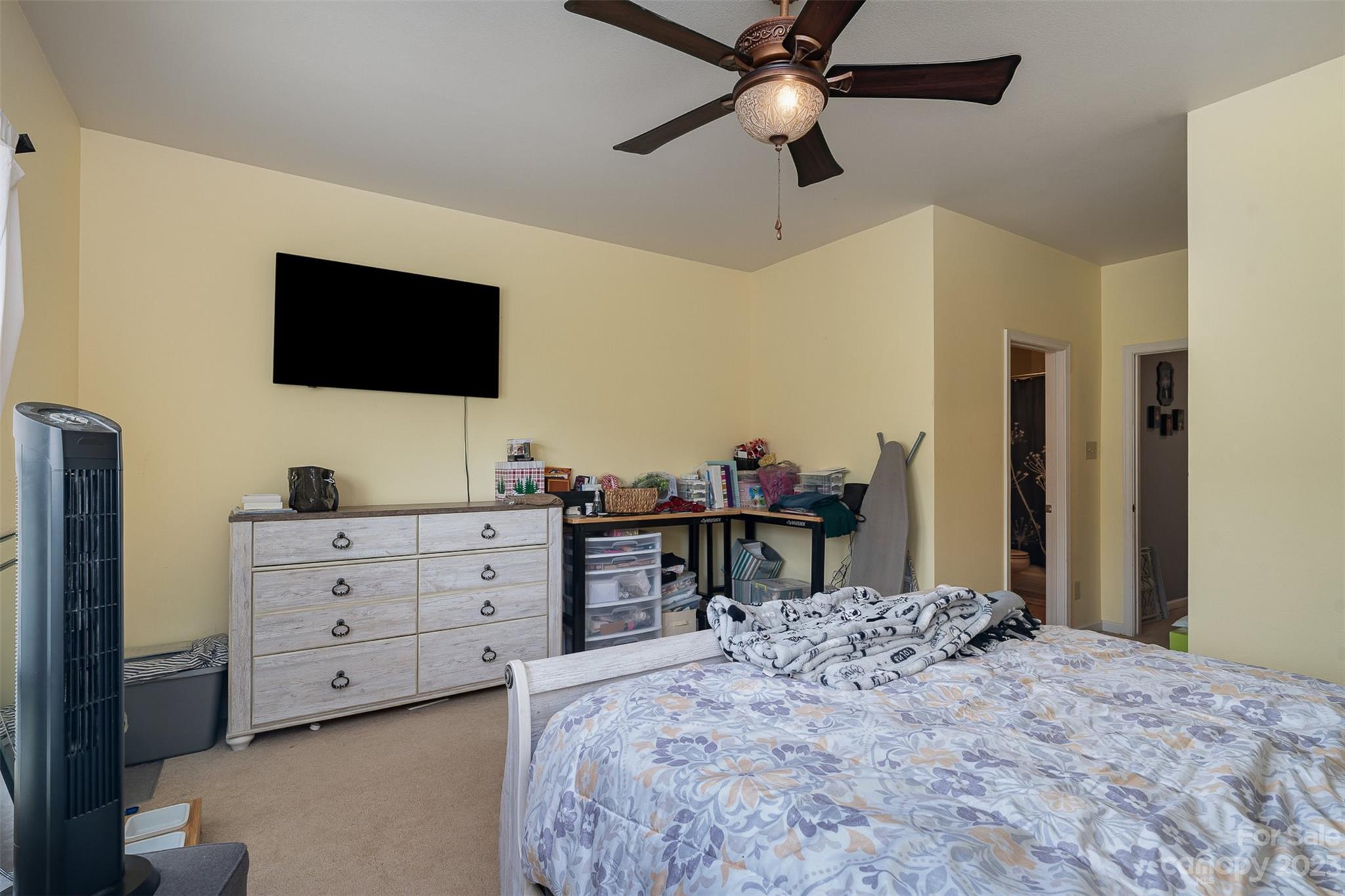 2070 Durand Road Fort Mill, SC 29715 - Photo 18 of 28 a bed room with a bed and a television