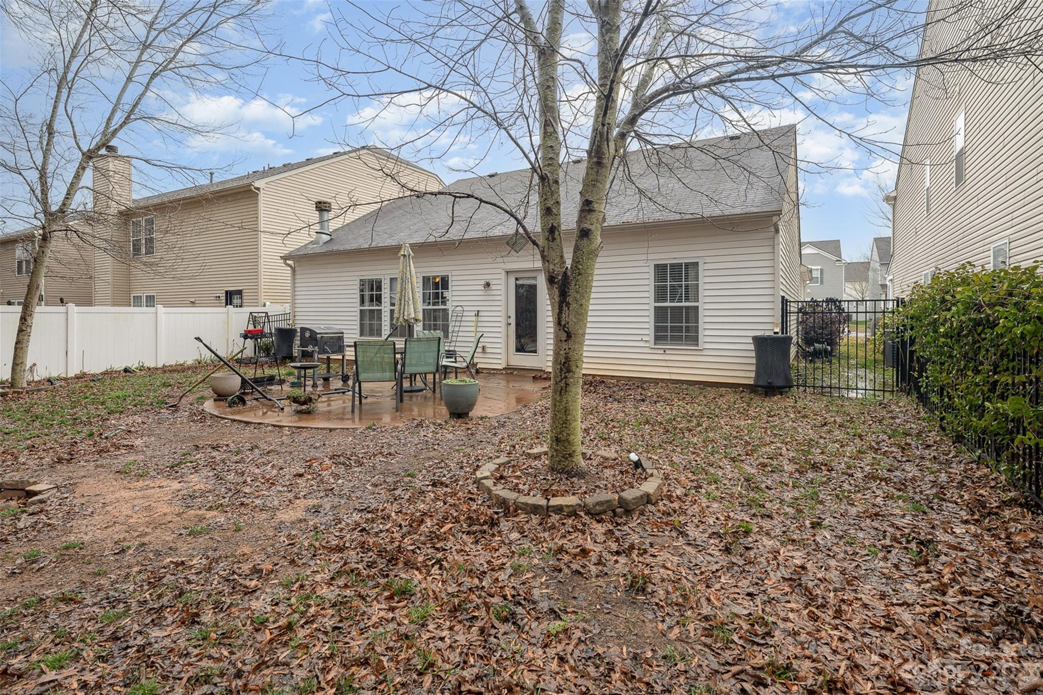 2070 Durand Road Fort Mill, SC 29715 - Photo 28 of 28 a view of a house with a yard covered in the forest