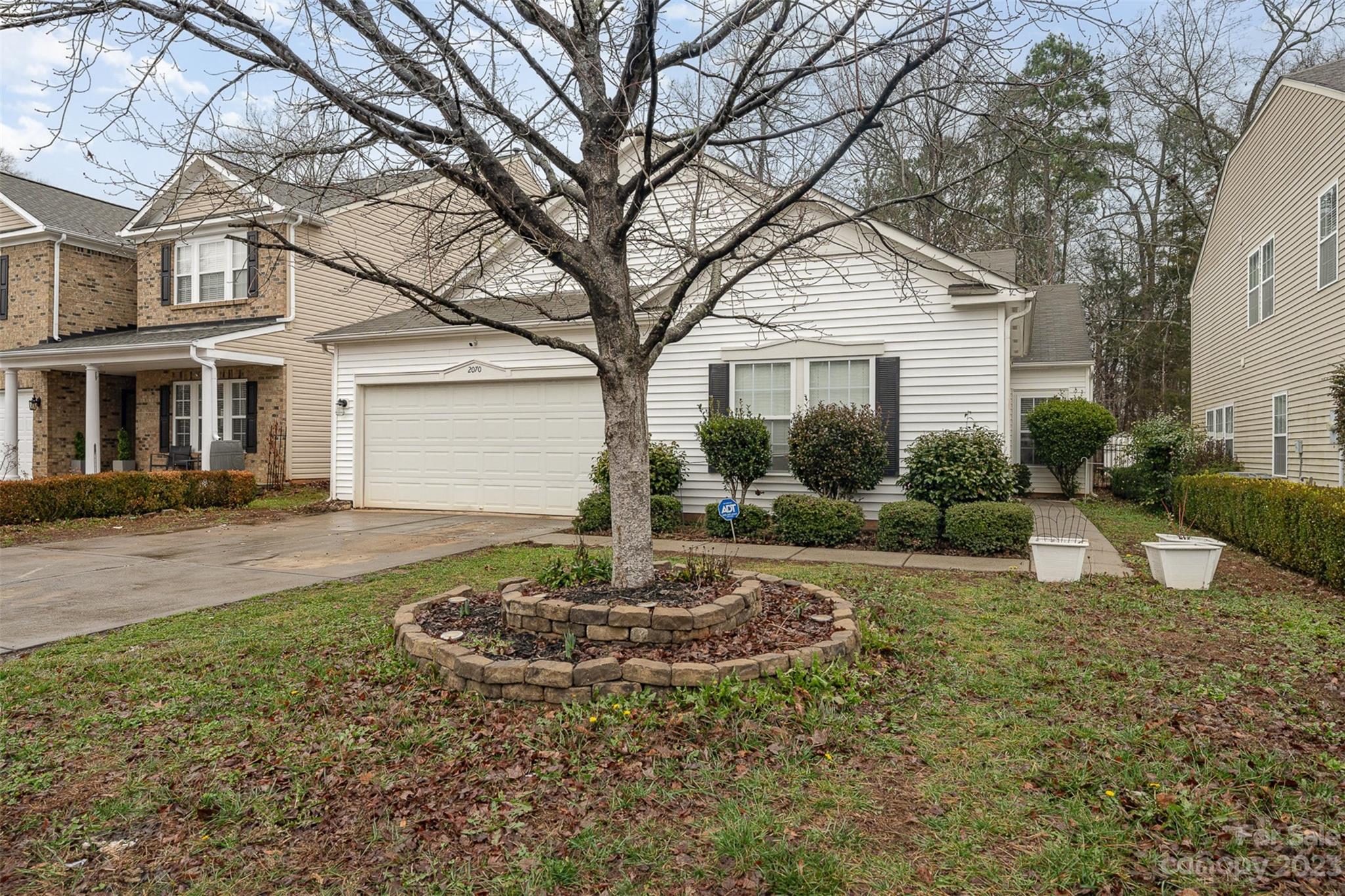 2070 Durand Road Fort Mill, SC 29715 - Photo 3 of 28 a house view with a garden space
