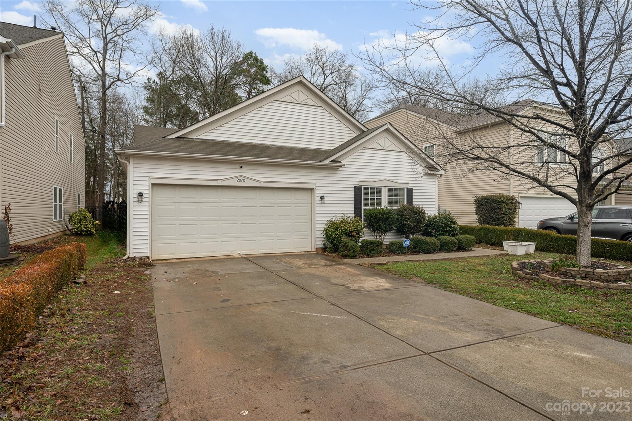 2070 Durand Road Fort Mill, SC 29715 - Photo 4 of 28 a front view of a house with garden